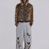 Pantalones Monster Joggers holgados en gris jaspeado desgastado
