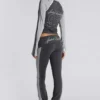 Pantalones sport «Rynna» con corte acampanado y vuelta en el bajo