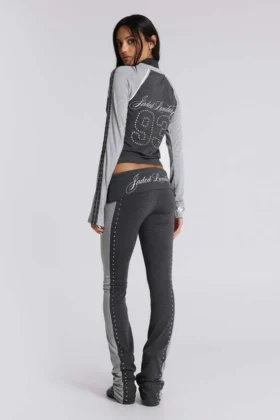 Pantalones sport «Rynna» con corte acampanado y vuelta en el bajo