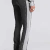 Pantalones sport «Rynna» con corte acampanado y vuelta en el bajo