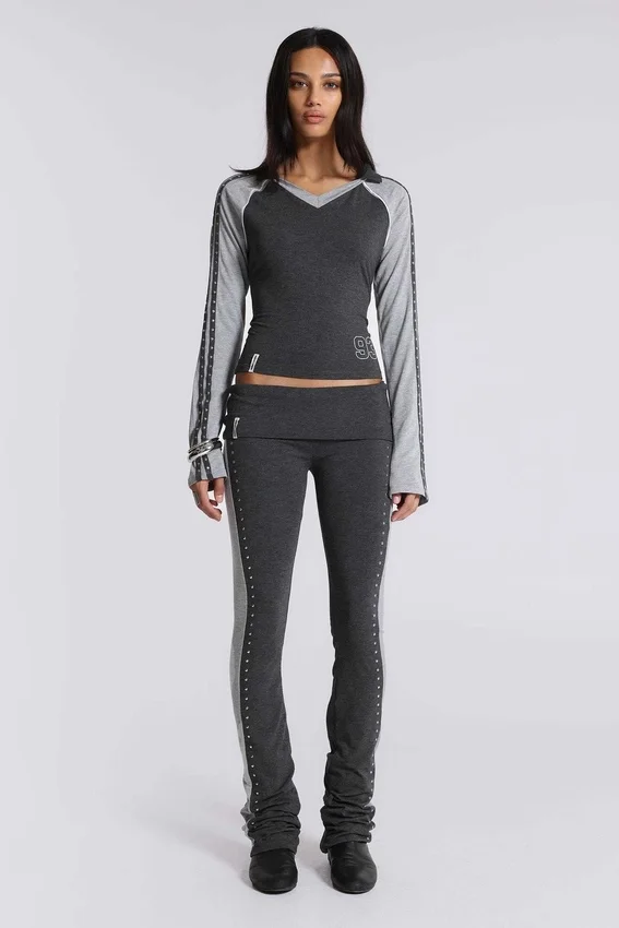 Pantalones sport «Rynna» con corte acampanado y vuelta en el bajo