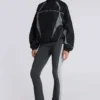 Pantalones sport «Rynna» con corte acampanado y vuelta en el bajo