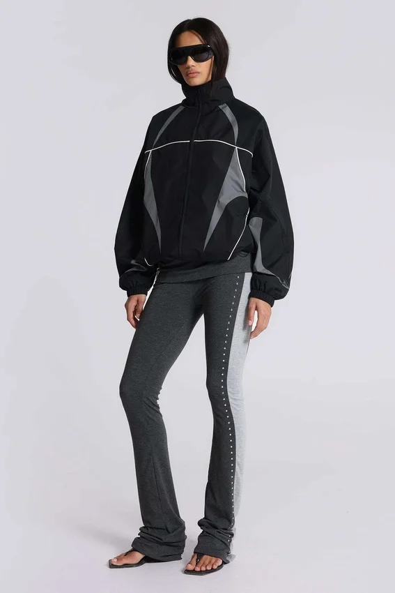 Pantalones sport «Rynna» con corte acampanado y vuelta en el bajo