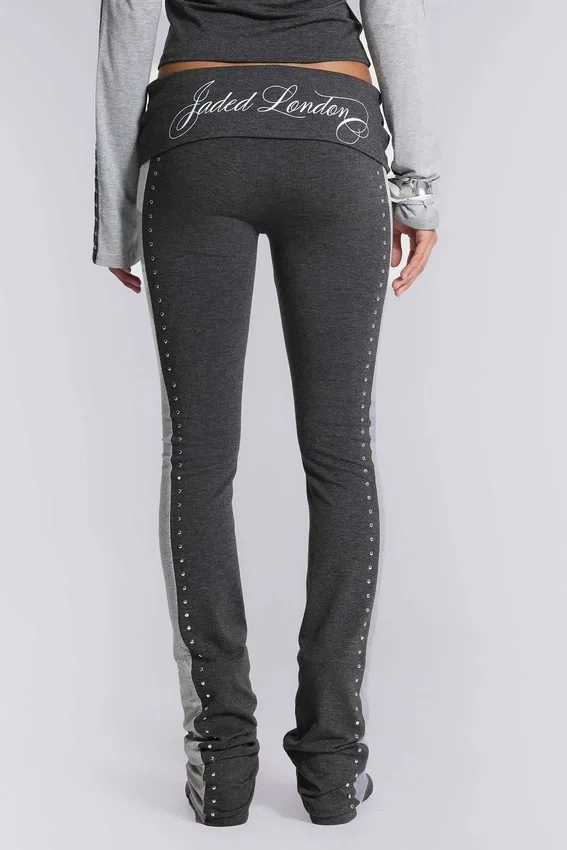 Pantalones sport «Rynna» con corte acampanado y vuelta en el bajo