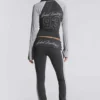 Pantalones sport «Rynna» con corte acampanado y vuelta en el bajo