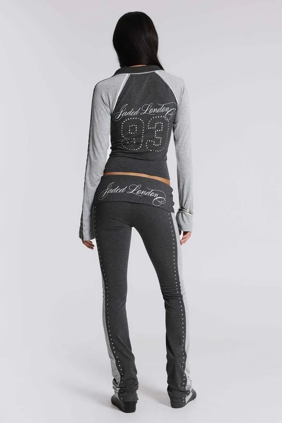 Pantalones sport «Rynna» con corte acampanado y vuelta en el bajo