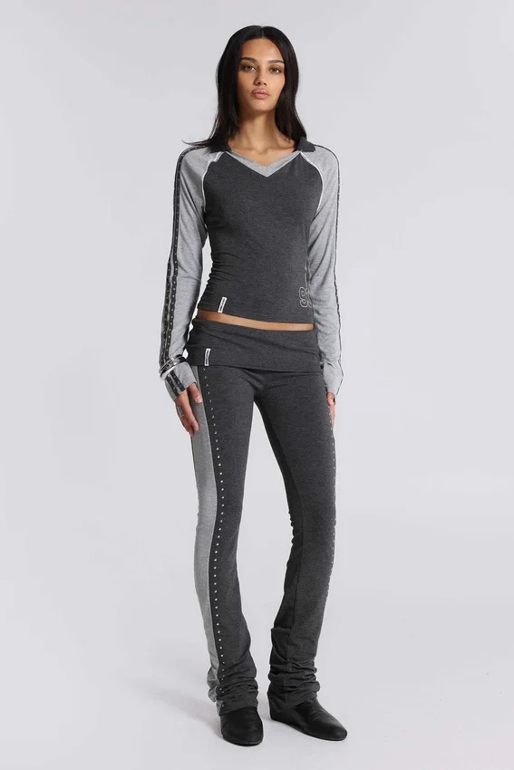 Pantalones sport «Rynna» con corte acampanado y vuelta en el bajo
