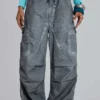 Parachute Pants negros con lavado al aceite