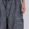 Parachute Pants negros con lavado al aceite