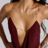 Partes de arriba con cuello vuelto y espalda descubierta Asteria en color burdeos