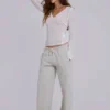 Pantalones jogger holgados de corte acampanado Cleo en gris jaspeado