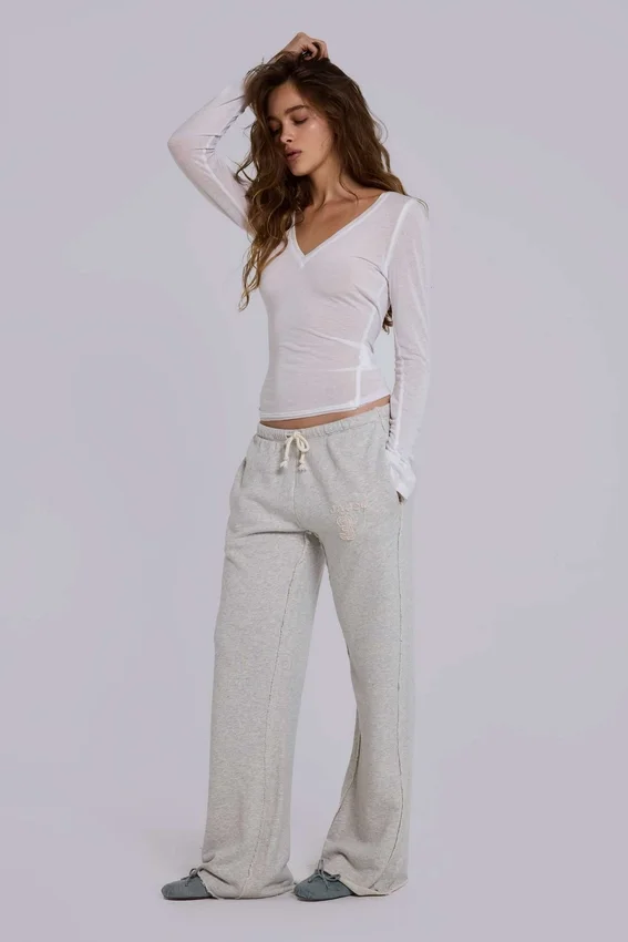 Pantalones jogger holgados de corte acampanado Cleo en gris jaspeado