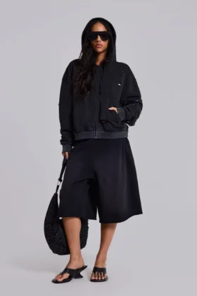 Sudadera con capucha, cremallera y forro de tejido de panal, en negro lavado y efecto descolorido por el sol