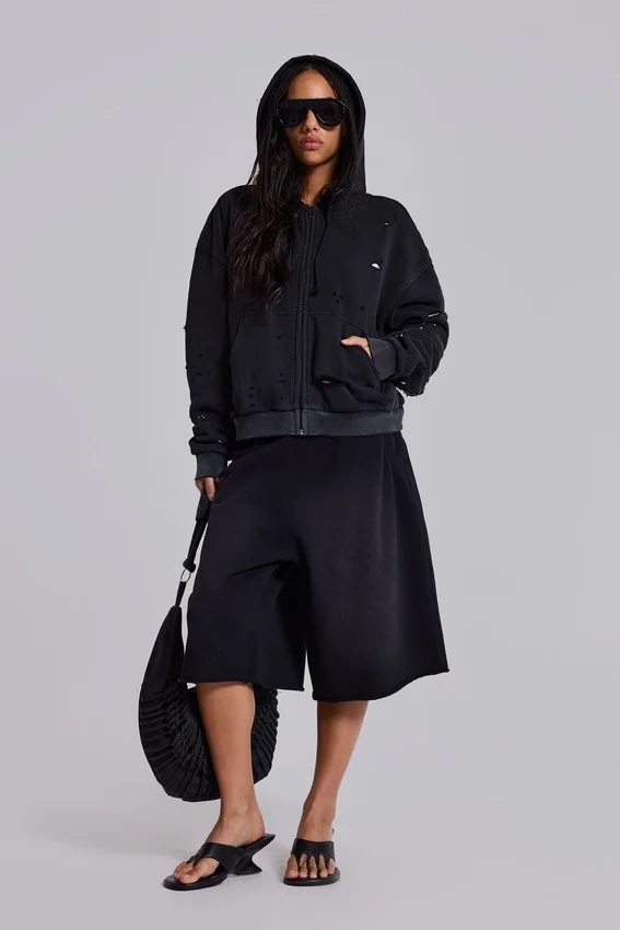 Sudadera con capucha, cremallera y forro de tejido de panal, en negro lavado y efecto descolorido por el sol