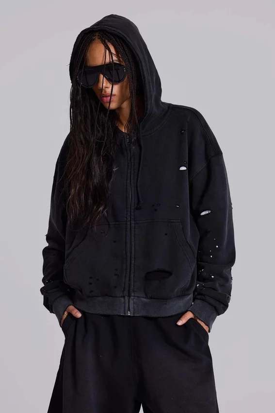 Sudadera con capucha, cremallera y forro de tejido de panal, en negro lavado y efecto descolorido por el sol