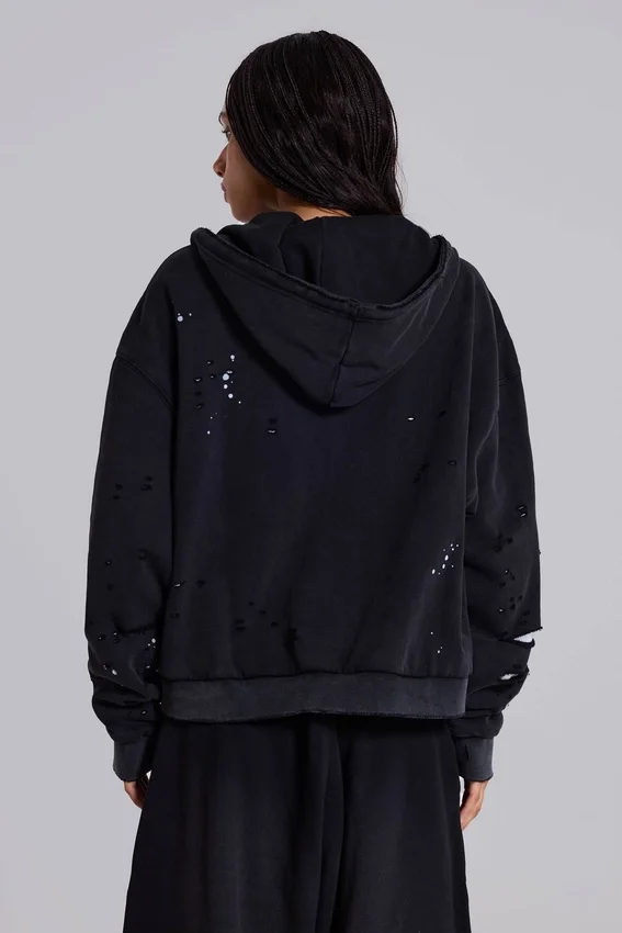 Sudadera con capucha, cremallera y forro de tejido de panal, en negro lavado y efecto descolorido por el sol