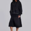 Sudadera con capucha, cremallera y forro de tejido de panal, en negro lavado y efecto descolorido por el sol