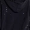 Sudadera con capucha, cremallera y forro de tejido de panal, en negro lavado y efecto descolorido por el sol