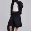 Sudadera con capucha, cremallera y forro de tejido de panal, en negro lavado y efecto descolorido por el sol