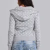 Sudadera con capucha gris de lunares