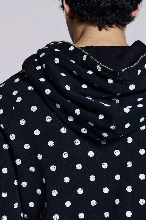 Sudadera con capucha Mono negra con lunares