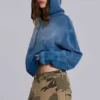 Sudadera con capucha «Monster» de tejido de gofre con tachuelas y efecto descolorido