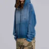 Sudadera con capucha «Monster» de tejido de gofre con tachuelas y efecto descolorido