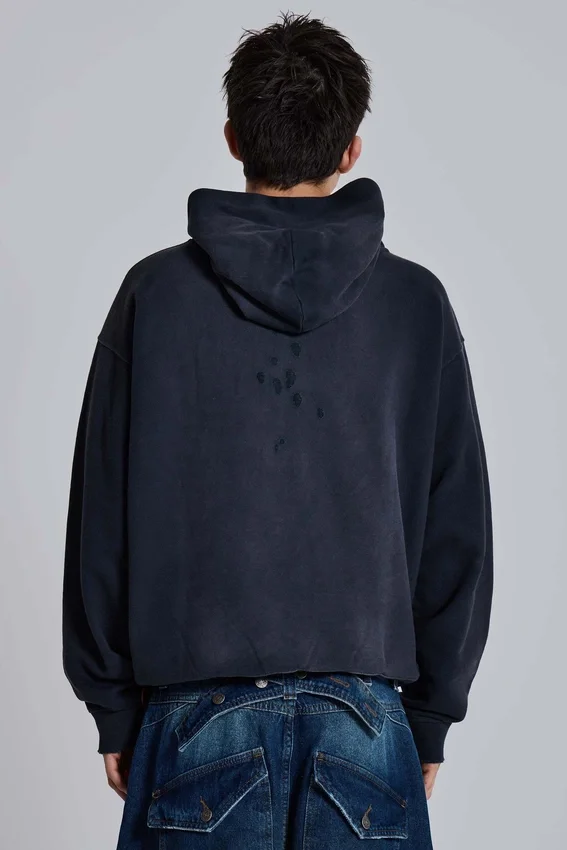 Sudadera con capucha y emblema