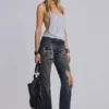 Vaqueros bootcut de talle bajo con encaje desgastado «Tori»