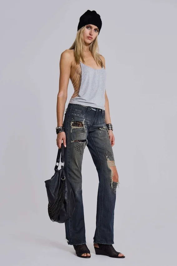 Vaqueros bootcut de talle bajo con encaje desgastado «Tori»