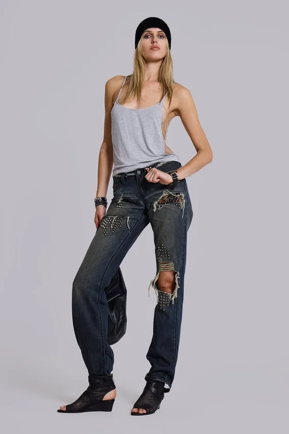 Vaqueros bootcut de talle bajo con encaje desgastado «Tori»