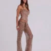 Pantalones de punto con lentejuelas Deva en color arena