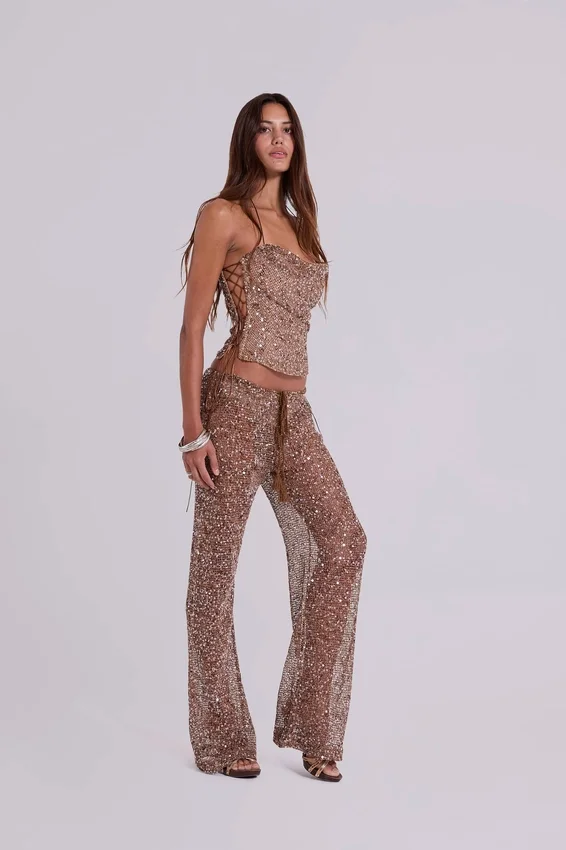 Pantalones de punto con lentejuelas Deva en color arena