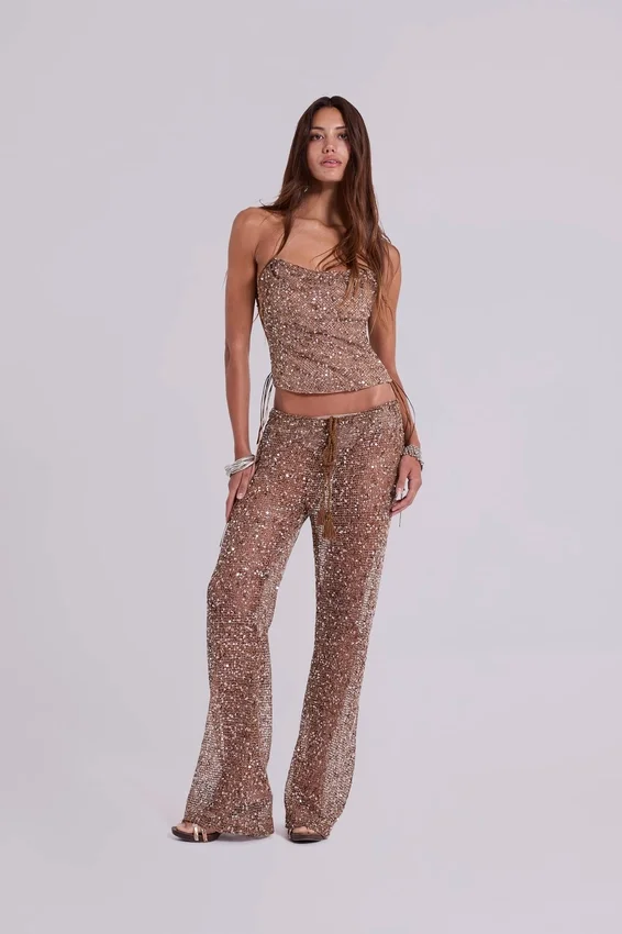 Pantalones de punto con lentejuelas Deva en color arena