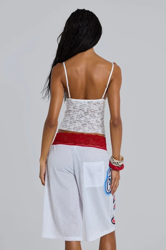 Top tipo camisola con encaje Kickoff