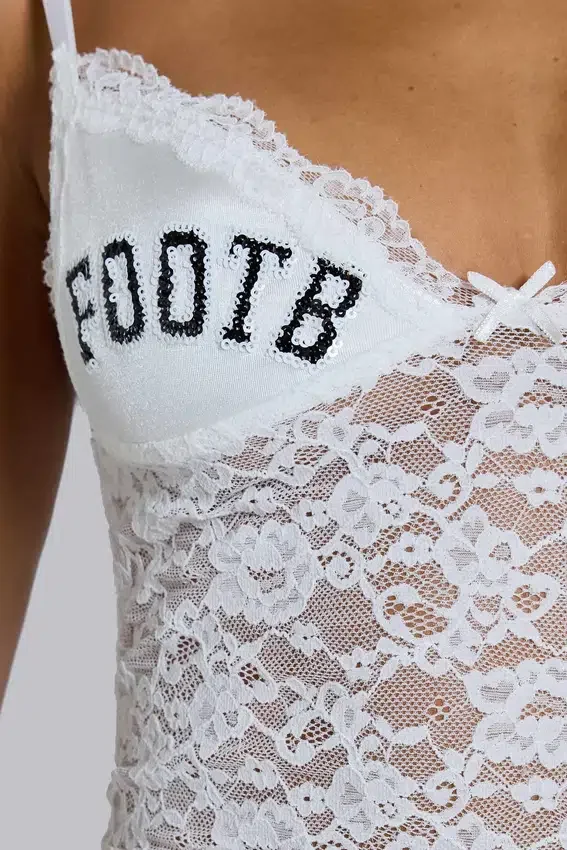 Top tipo camisola con encaje Kickoff