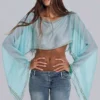 Top tipo capa con tachuelas Lunet