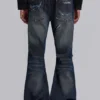 Vaqueros bootcut «Blue Drift» con cadena cruzada