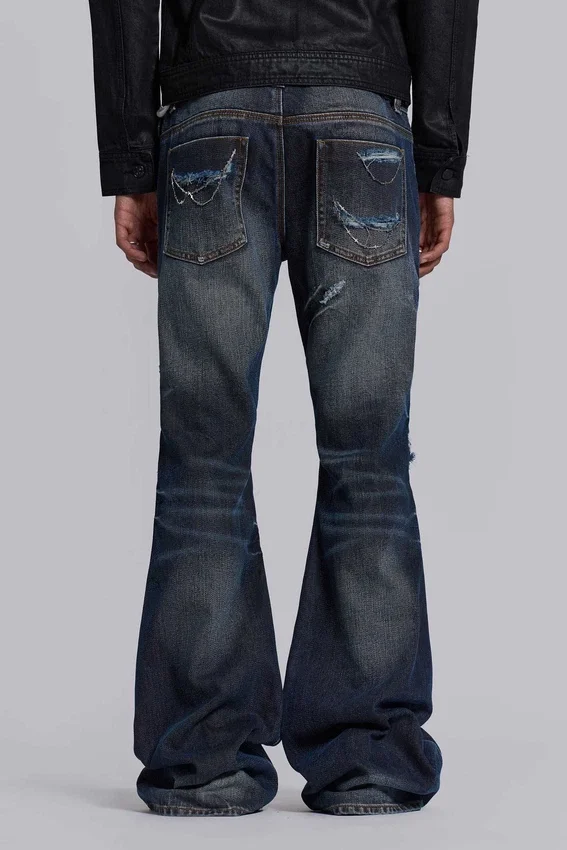 Vaqueros bootcut «Blue Drift» con cadena cruzada