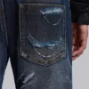 Vaqueros bootcut «Blue Drift» con cadena cruzada