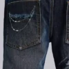 Vaqueros bootcut «Blue Drift» con cadena cruzada