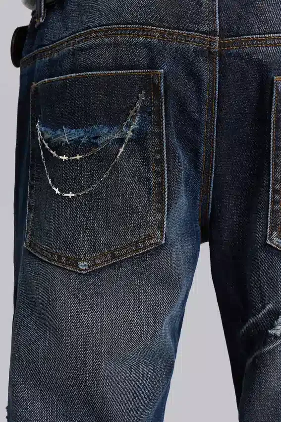 Vaqueros bootcut «Blue Drift» con cadena cruzada