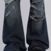 Vaqueros bootcut «Blue Drift» con cadena cruzada
