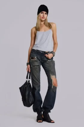 Vaqueros bootcut de talle bajo con encaje desgastado «Tori»