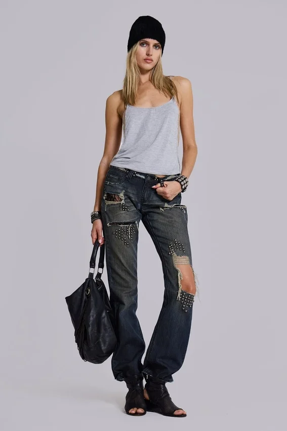 Vaqueros bootcut de talle bajo con encaje desgastado «Tori»