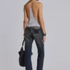 Vaqueros bootcut de talle bajo con encaje desgastado «Tori»