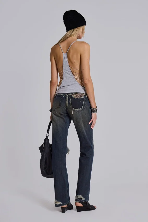 Vaqueros bootcut de talle bajo con encaje desgastado «Tori»