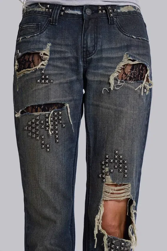 Vaqueros bootcut de talle bajo con encaje desgastado «Tori»