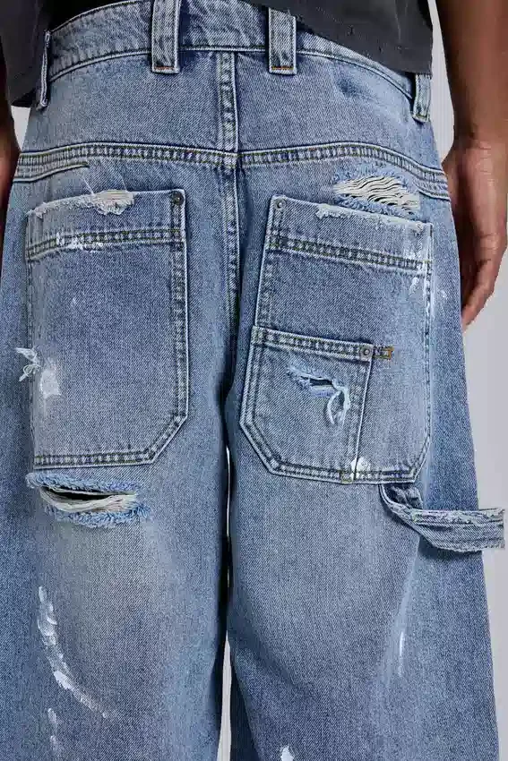 Vaqueros Carpenter azules desgastados de estilo vintage
