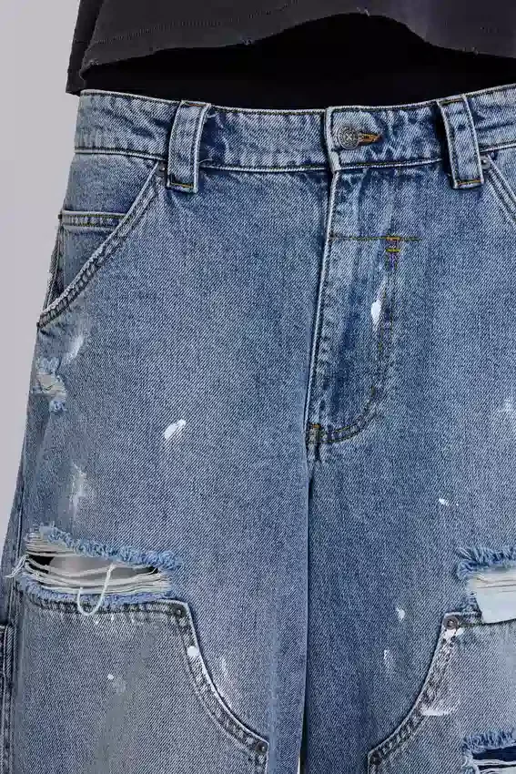 Vaqueros Carpenter azules desgastados de estilo vintage